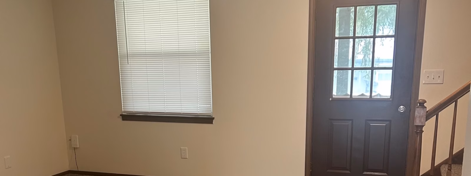 nottingham-court-townhome-carpeted-living-room-2